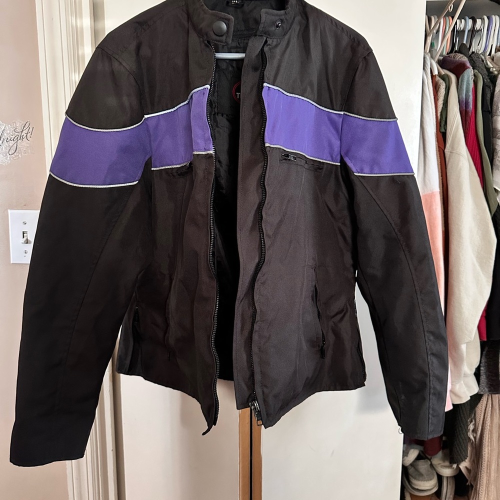 Women’s Black and Purple lightweight riding jacket.